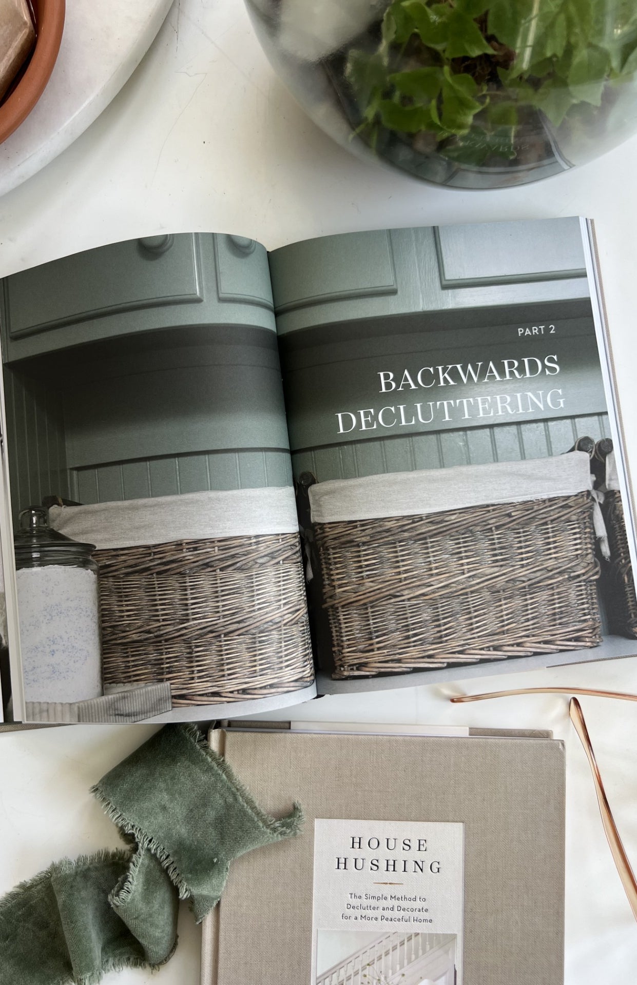 Image of the interior of "House Hushing." The section is titled "Part 2: Backward Decluttering."