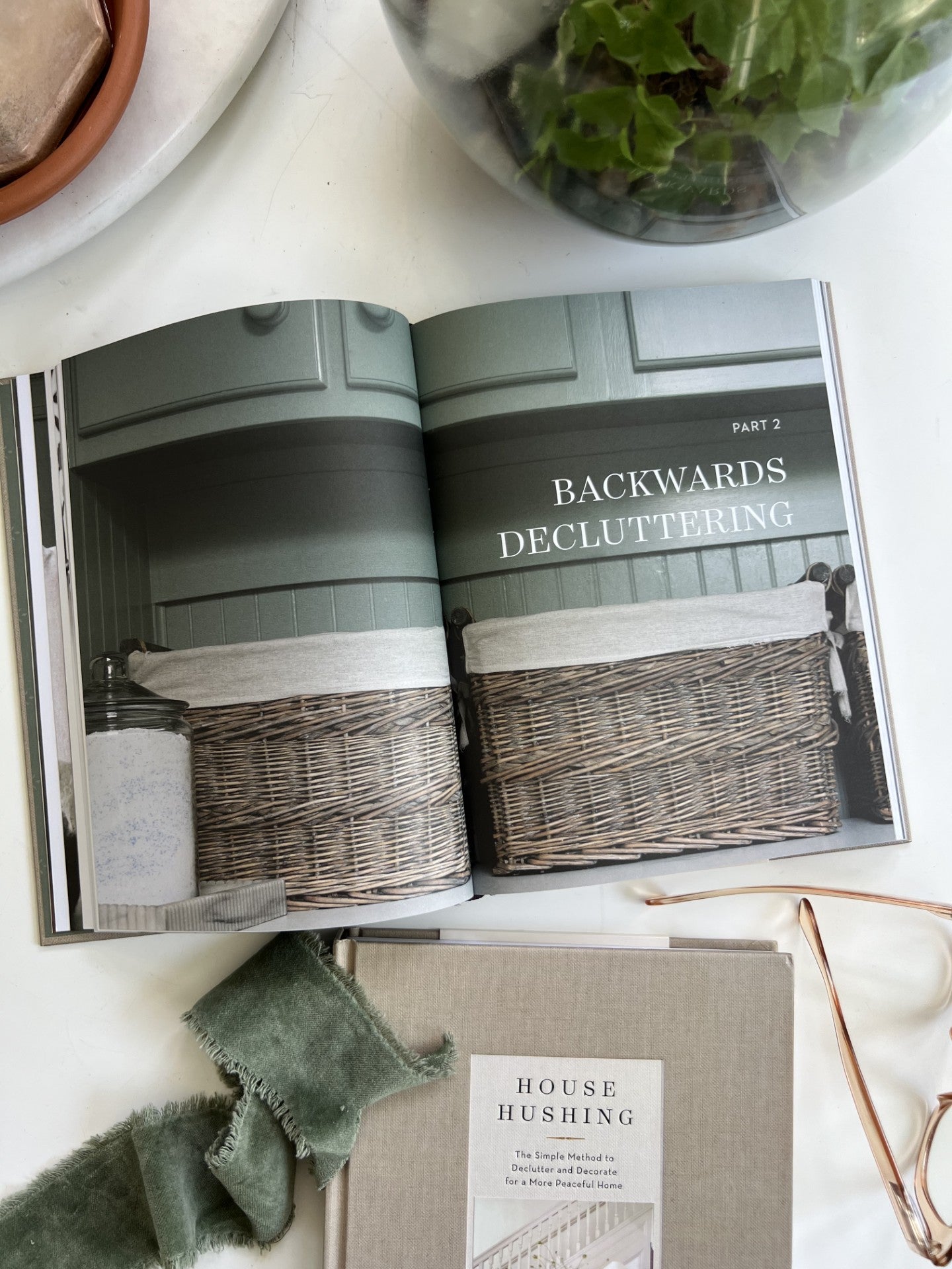 Image of the interior of "House Hushing." The section is titled "Part 2: Backward Decluttering."